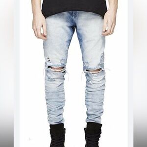 Represent knee destroyer jeans